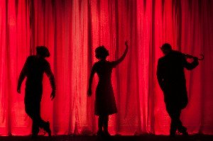 The Collective Gasp: Why Live Theater's Magic Endures in a Digital Age